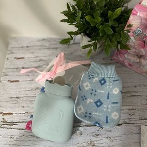 Microwaveable hot water bottle with cover for sale